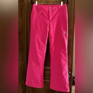 Hot pink Spyder snow pants.